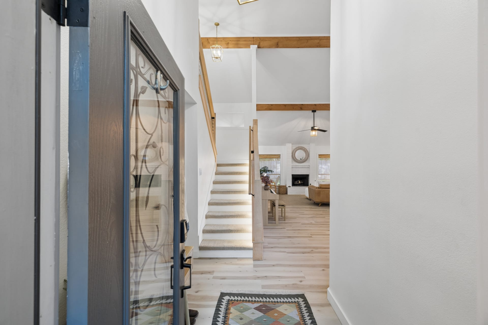 Curated minimalist entryway with organic textures and natural lighting